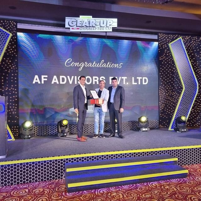 Godrej Housing Finance — "Gear-Up for Industry-Best LAP" recognition on stage